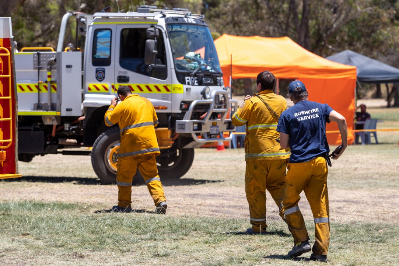 Emergency crew, such as those at Mandogalup Volunteer Bush Fire Brigade on Monday, comtinue to fight bushfires near Perth. 