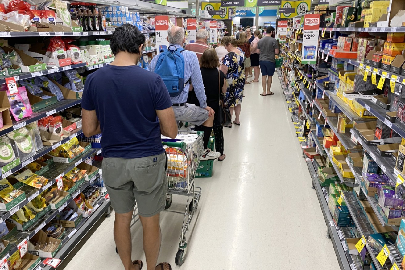 Shoppers line up at Mt Gravatt in Brisbane.