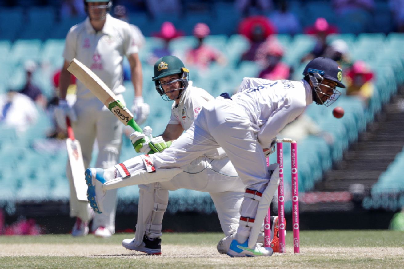 Australia's Tim Paine sends to the boundary on the fourth day of the third Test
