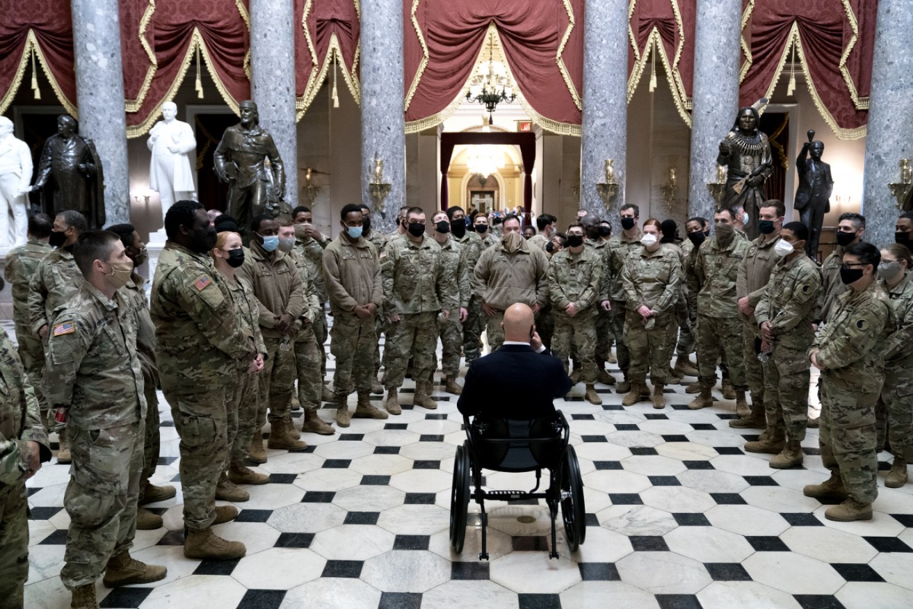 Rep. Brian Mast gives members of the National Guard a tour of the US Capitol. 