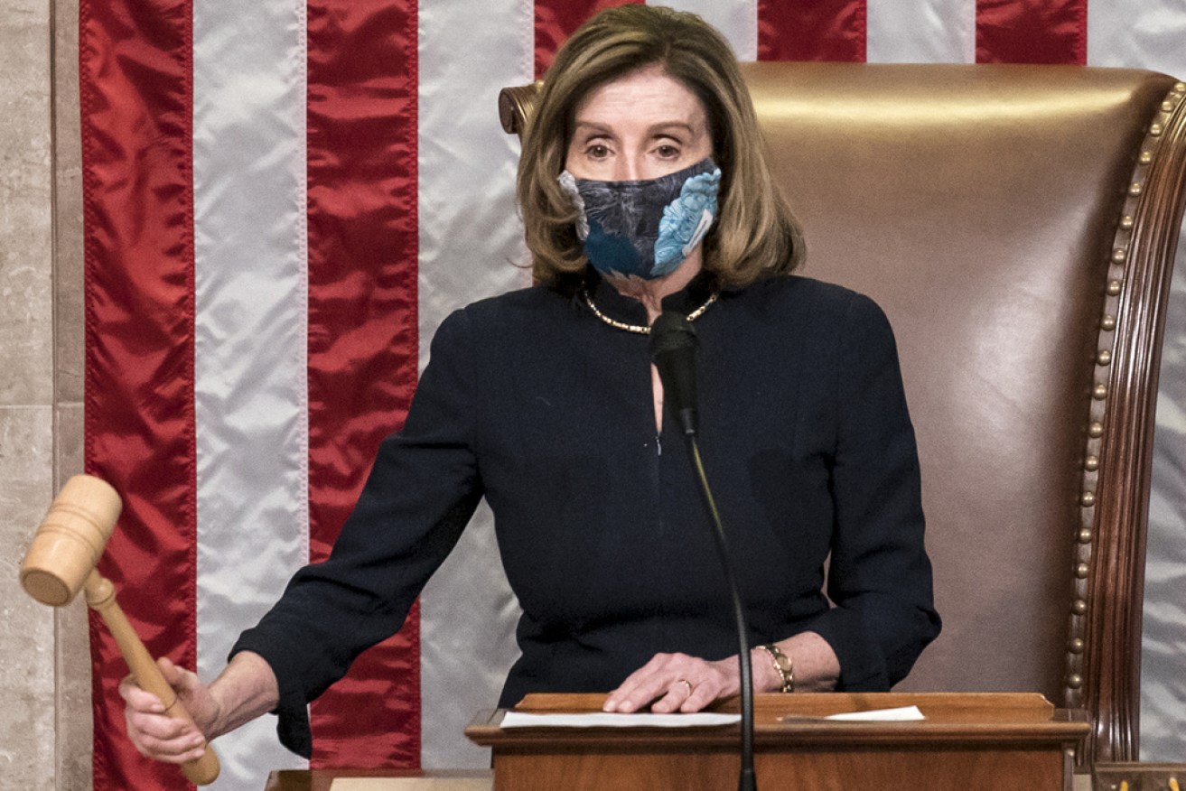 Nancy Pelosi announced Donald Trump's second impeachment in the same dress she announced his first.
