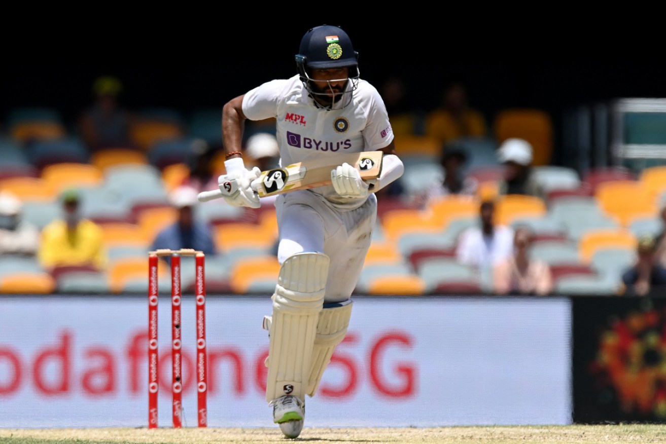 India's Cheteshwar Pujara has the Australian bowlers stumped as he digs in on day five.