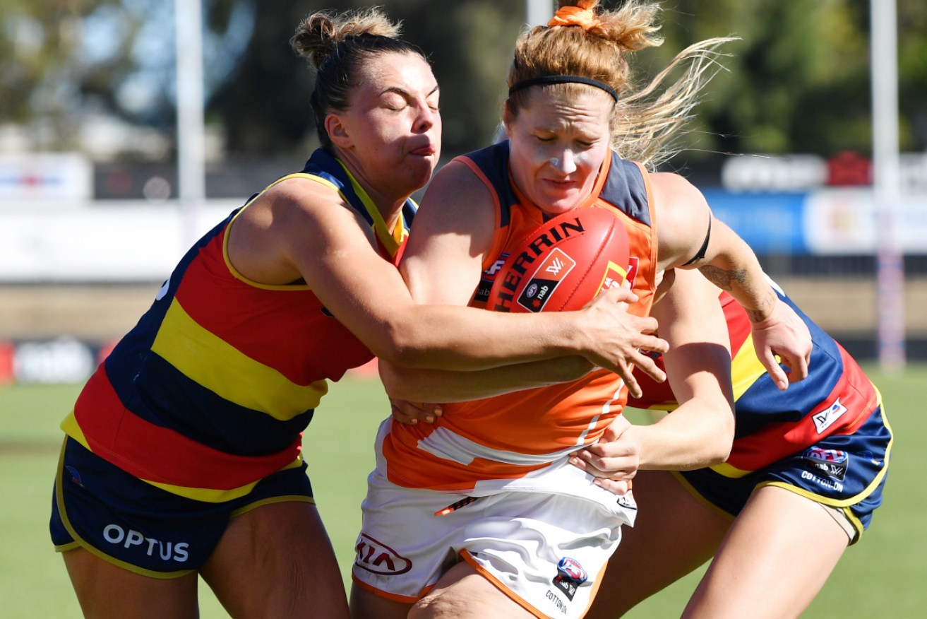 Ebony Marinoff tackles GWS’s Brittany Tully in the Round 6 AFLW match in March.