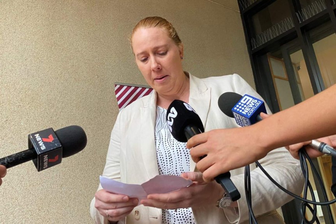 Dionne Batrice Grills read a statement outside the Cairns Magistrates Court after having a charge of manslaughter dropped.