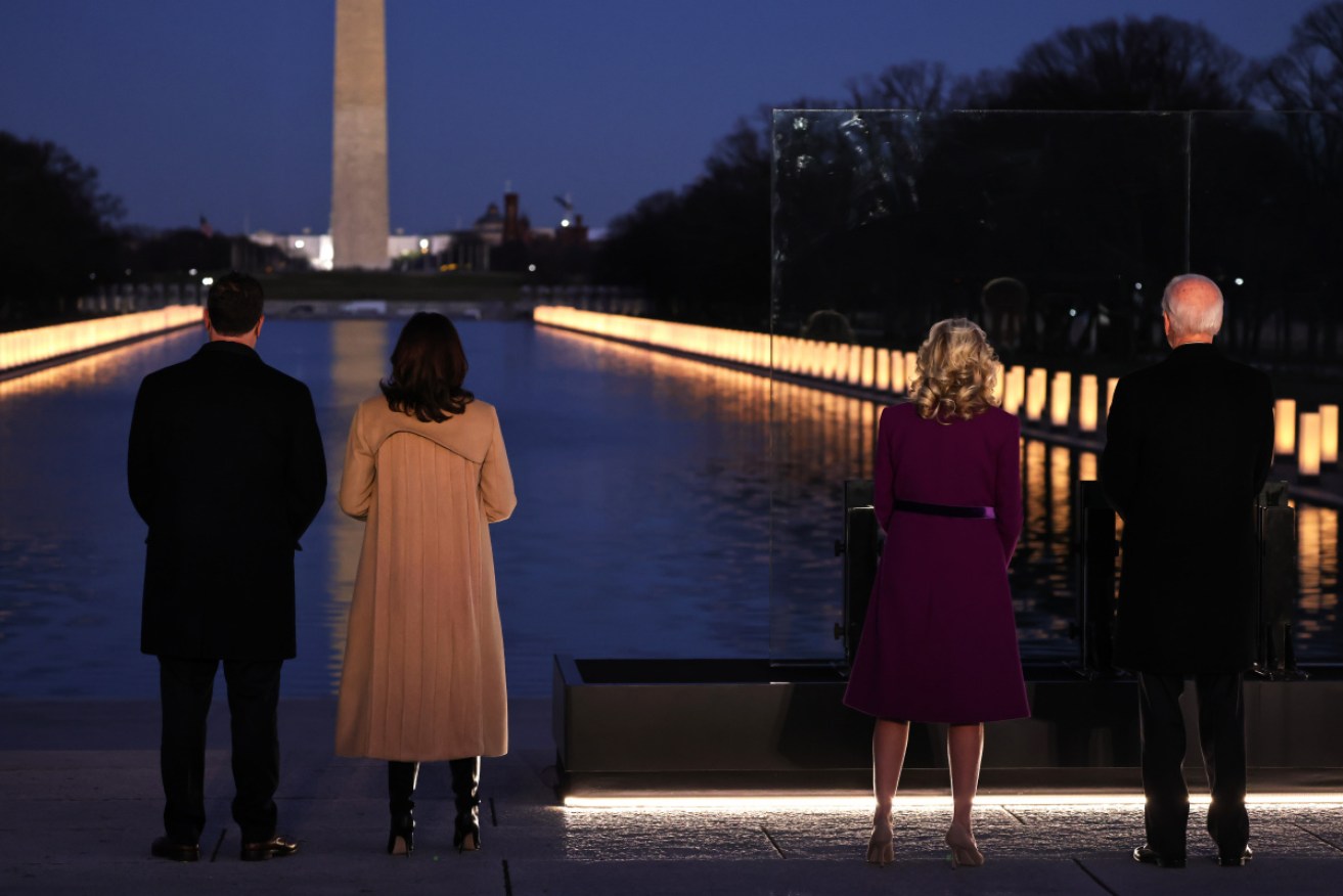 Mr Biden and his incoming VP honoured America's COVID dead at the capital.