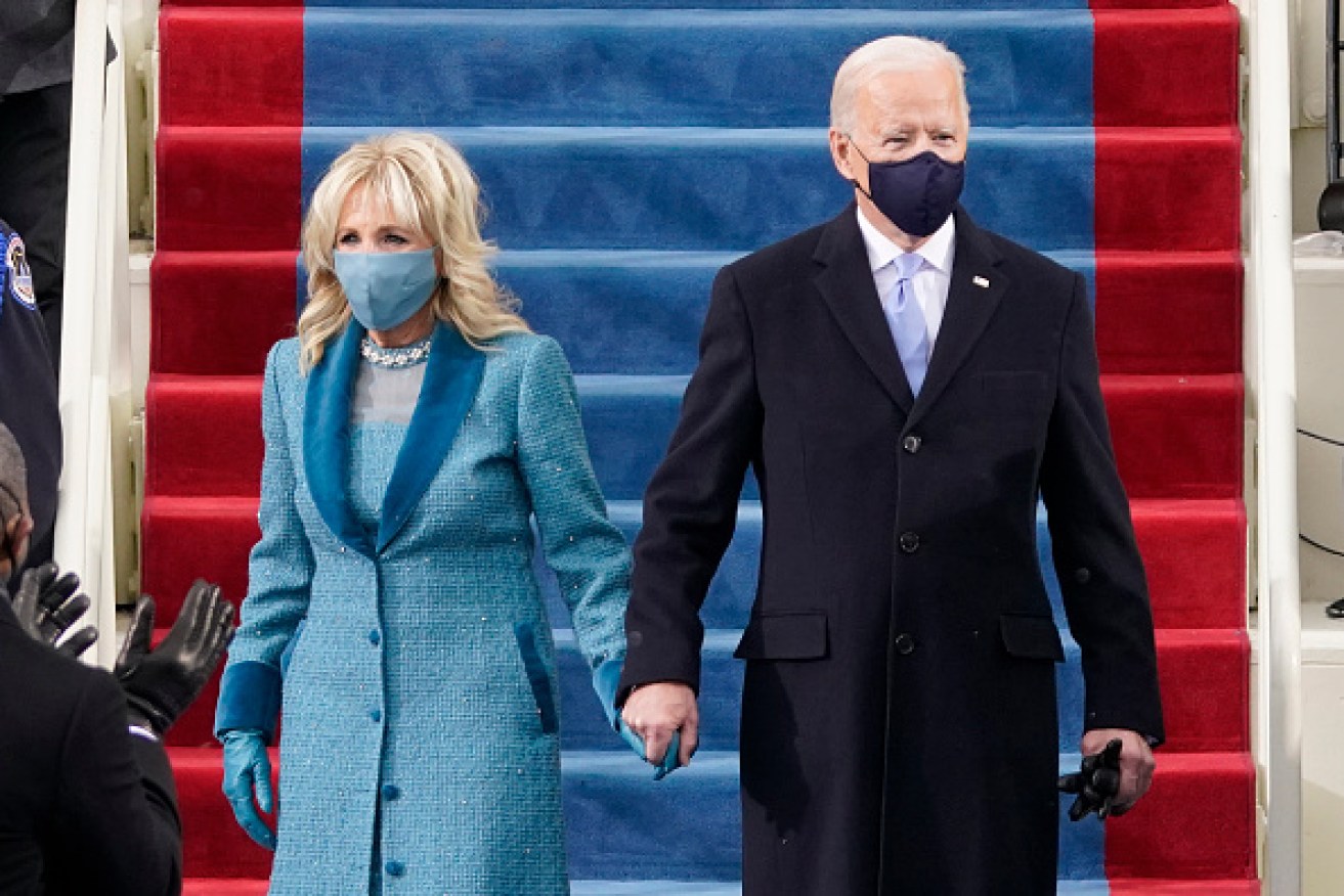 US President Joe Biden flanked by wife Dr Jill Biden arriving for his inauguration.