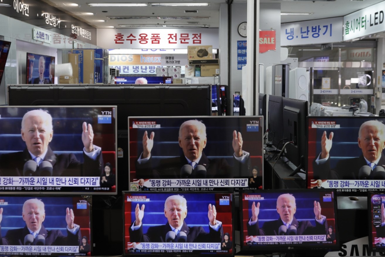 TV screens in South Korea show Joe Biden's inauguration.