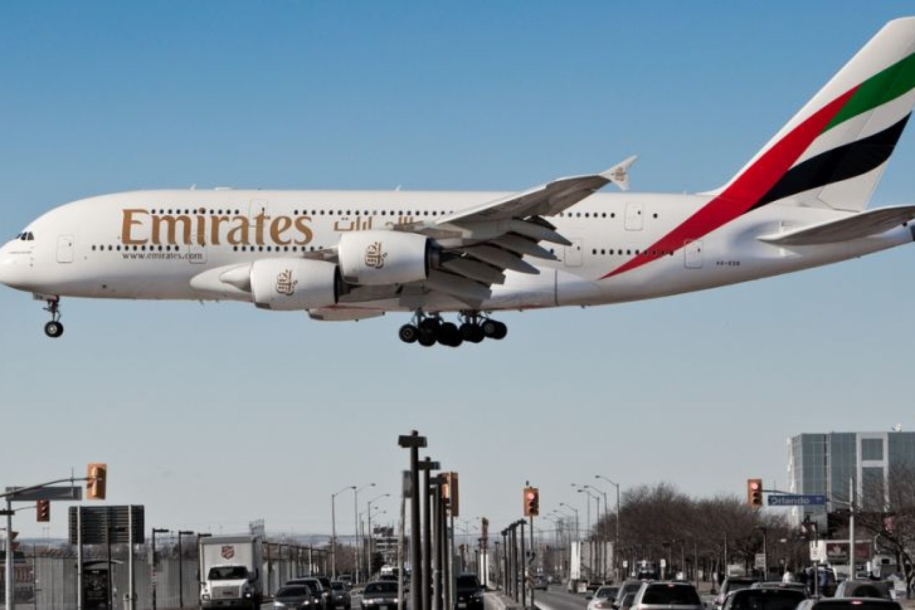 The woman came to Australia on an Emirates flight – but contracted the virus while in hotel quarantine.