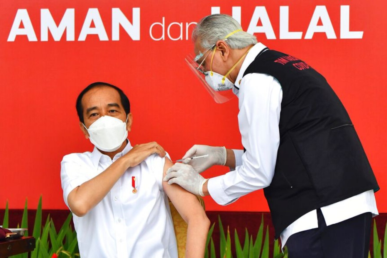 President Joko Widodo receives a shot of Sinovac's COVID-19 vaccine in Jakarta. <i>Photo: Office of President</i>