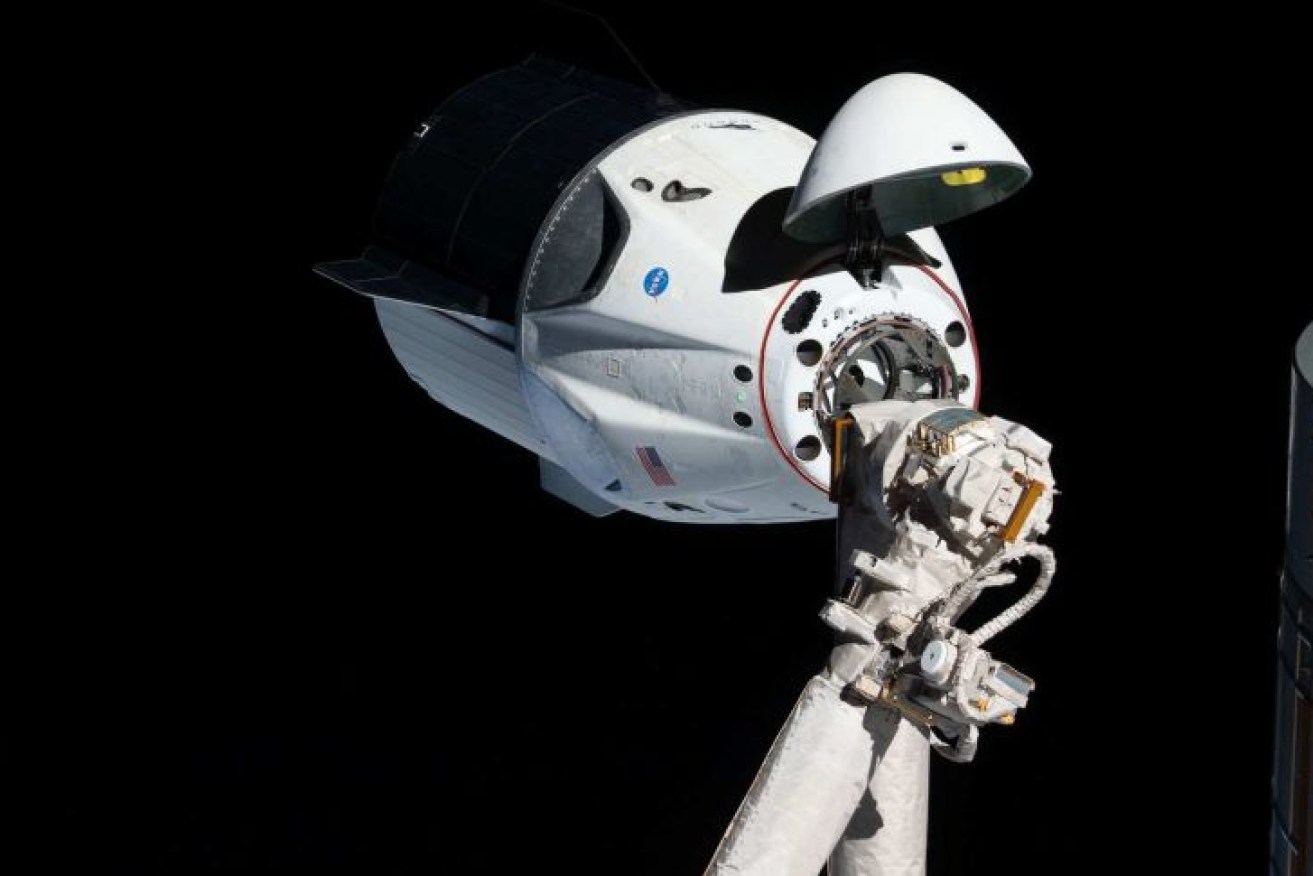 The crew will fly in a SpaceX Dragon capsule.