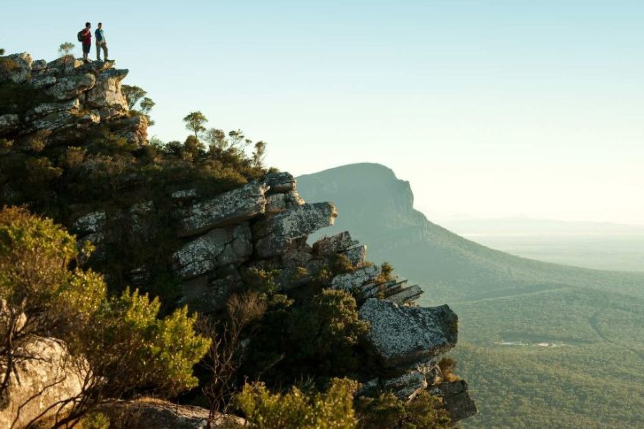 Hikers look out across the Grampians National Park in Victoria's east.