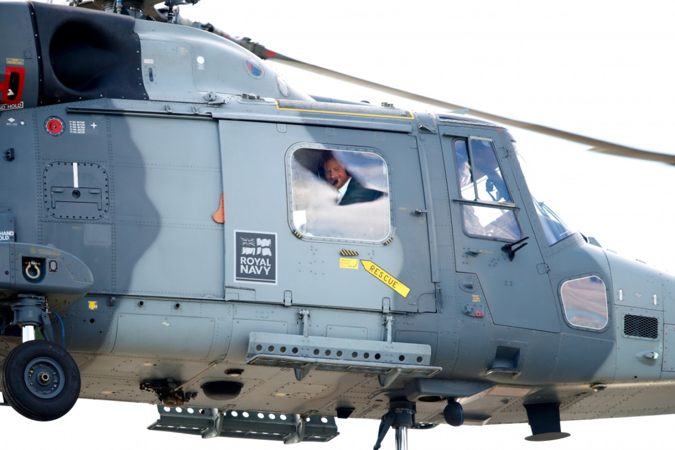 The Duke of Sussex inside a Royal Navy Wildcat Maritime Attack Helicopter as he departs The Royal Marines Commando Training Centre in 2018.