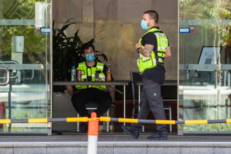 Travellers at WA virus hotel say guards not wearing masks