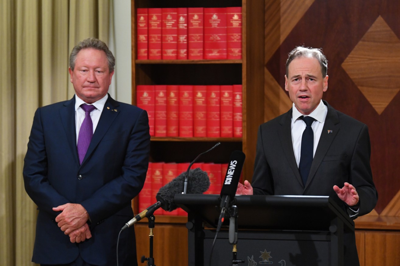 Andrew Forrest and Greg Hunt in Melbourne in April, announcing the deal for test kits
