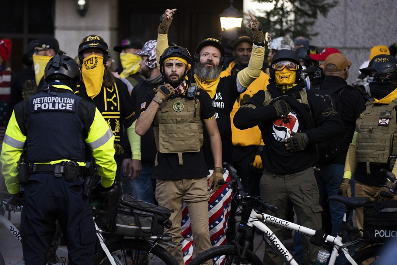Members of the Proud Boys and Antifa in a stand-off in Washington DC.