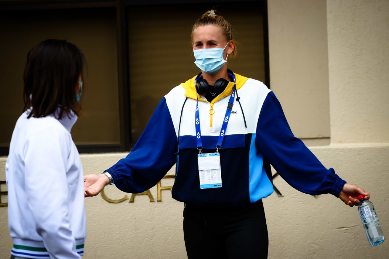 A competitor at the Australian Open waits outside the testing centre at the View Hotel.