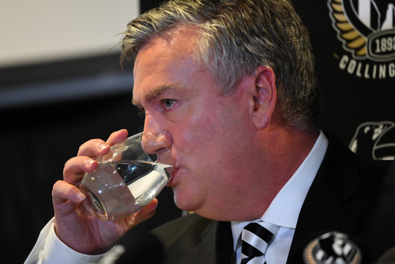 Eddie McGuire takes a moment during his emotional resignation speech. 