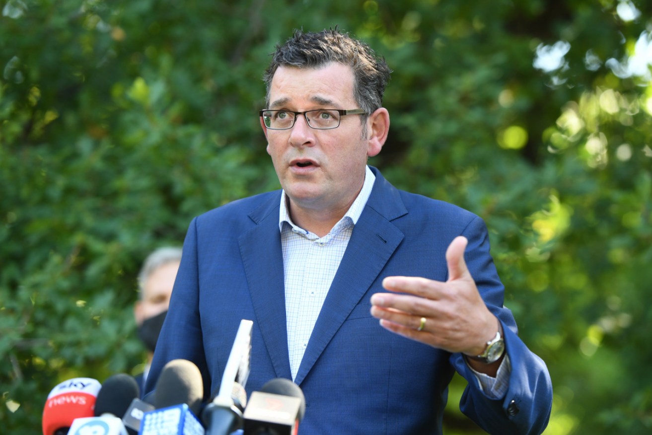 Daniel Andrews has cancelled a planned increase to flight caps