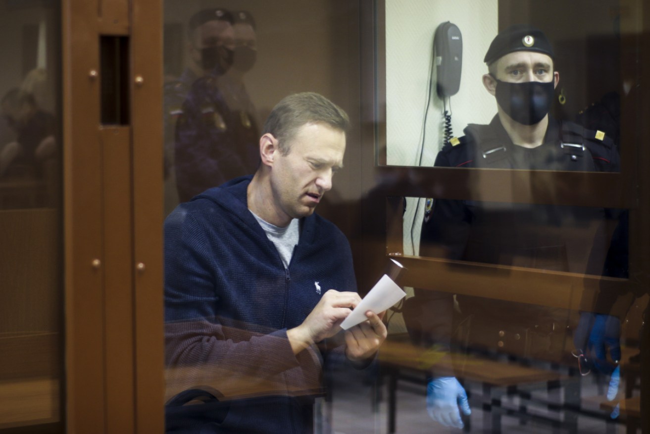 Russian opposition leader Alexei Navalny was caged during his Moscow trial.