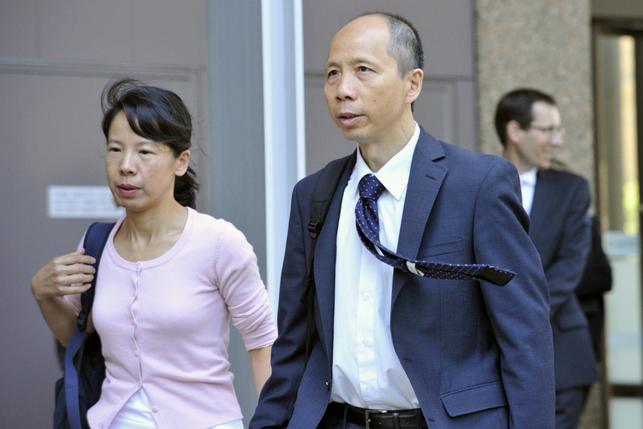Robert Xie and wife Kathy Lin leave a 2016 court hearing.