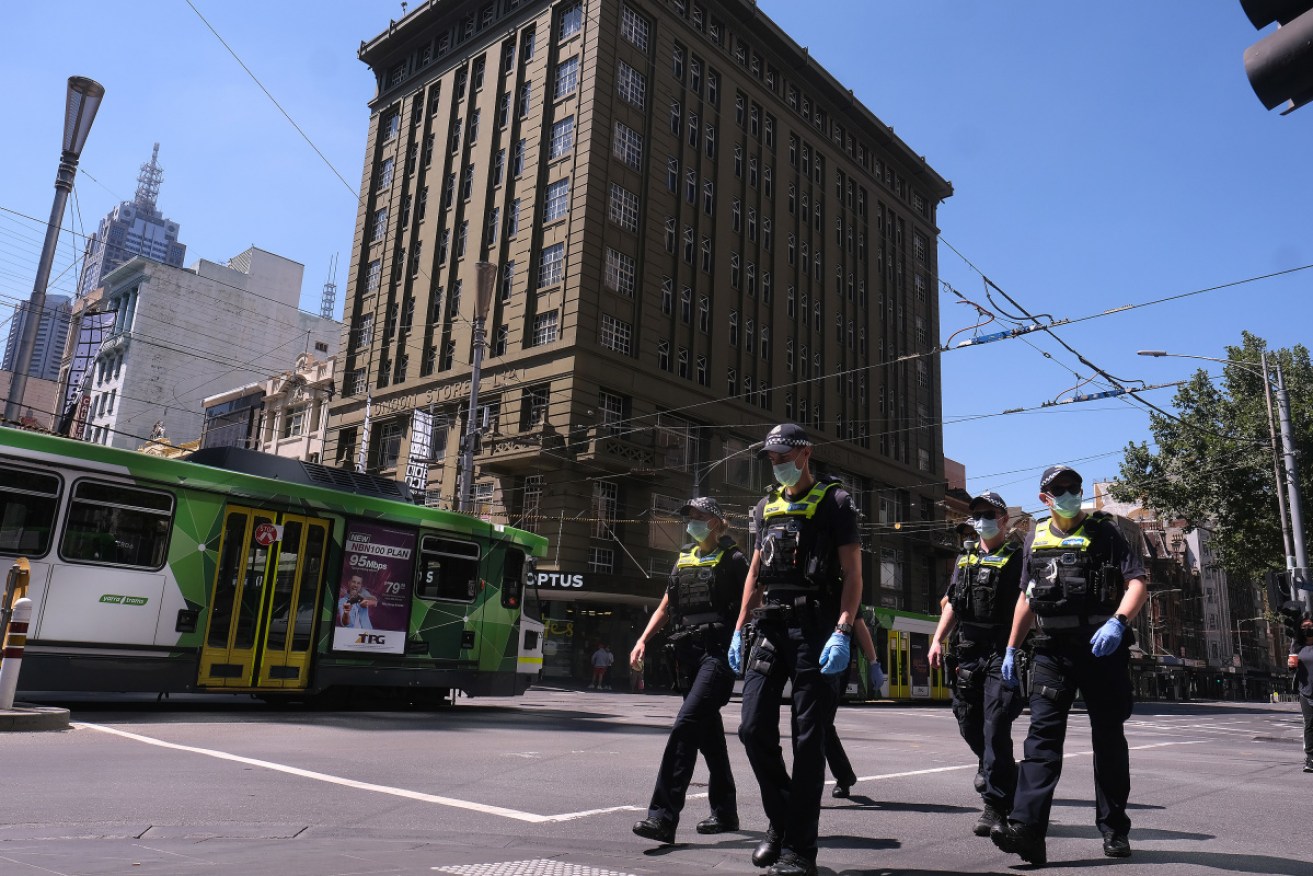 Police patrol Melbourne's CBD as Victorians endure their third lockdown in 12 months.