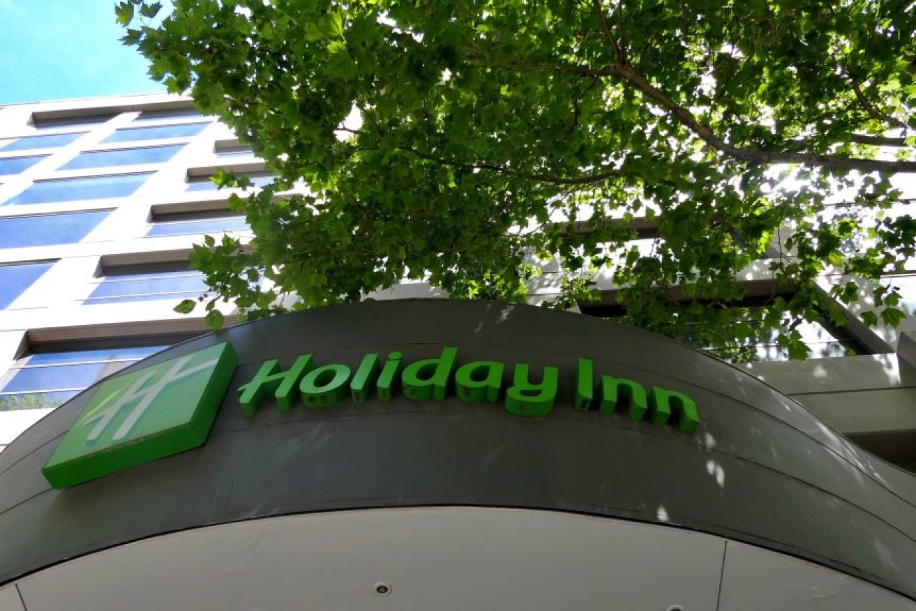 The flight attendant's virus infection was confirmed after she spent a night at the Holiday Inn Express, in Melbourne's Southbank.
