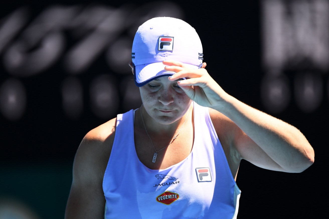 Ash Barty has been knocked out of her home grand slam in the quarter-finals.