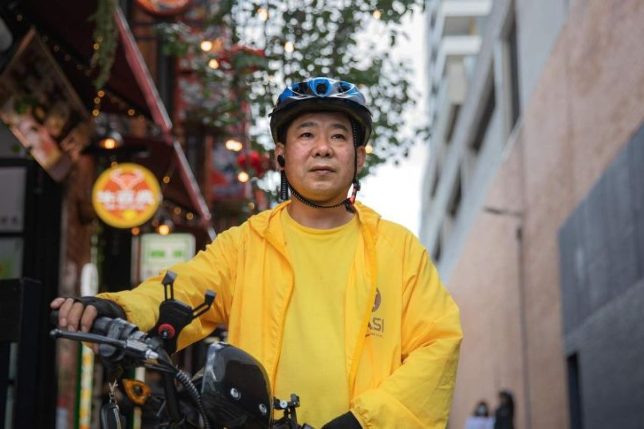 Former rider Xiangqian Li said he was sacked by the delivery giant without a warning.