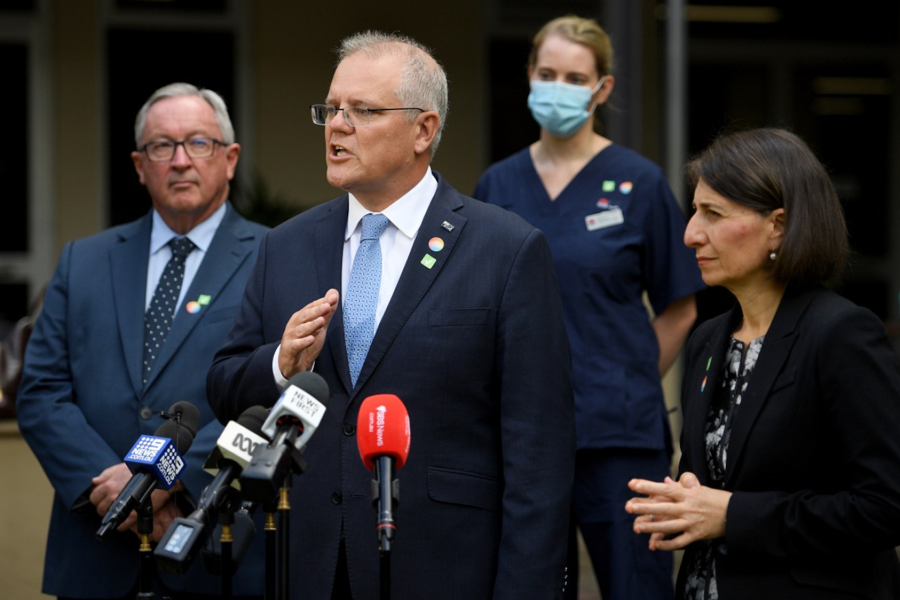 NSW Health Minister Brad Hazzard, PM Scott Morrison and Premier Gladys Berejiklian on Friday.