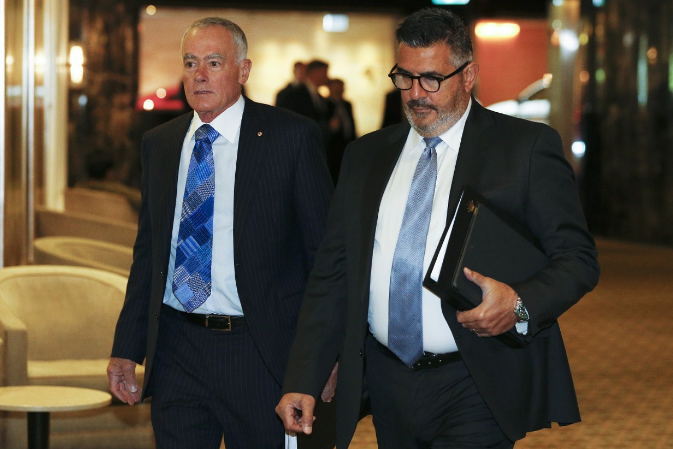 John Poynton and Andrew Demetriou at Crown's 2019 annual meeting. Both have now quit the company.