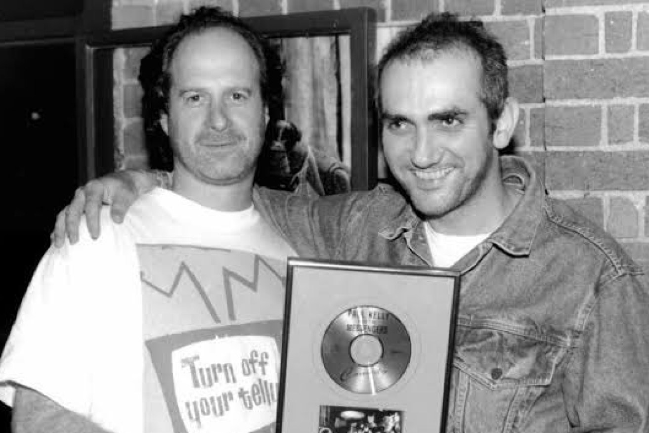 Michael Gudinski with musician Paul Kelly.