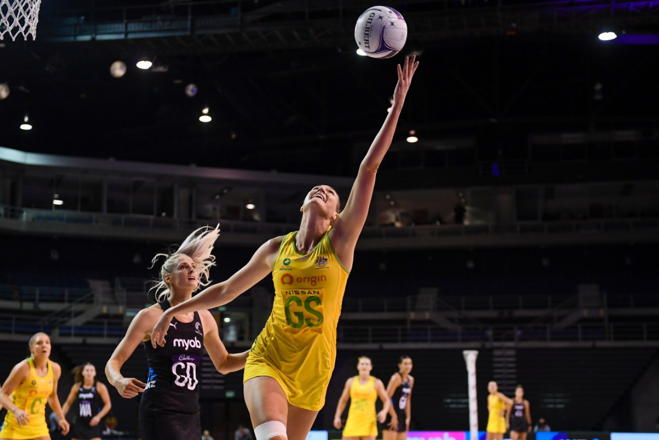 Caitlin Bassett reaches for the ball in the Constellation Cup match against the Silver Ferns in Christchurch on Tuesday.