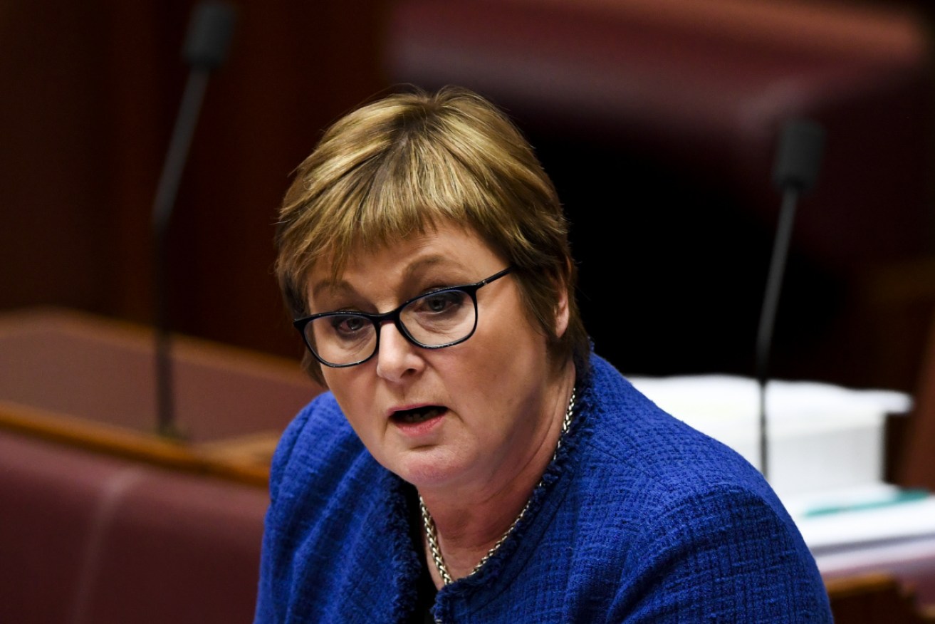 Cabinet minister Linda Reynolds has tested positive for COVID-19 while in Tasmania.