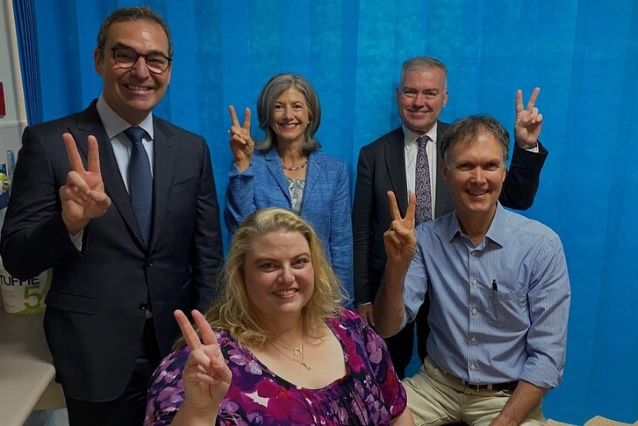 Caroline Phegan (front centre) was the first person in Australia to get the AstraZeneca vaccine. 