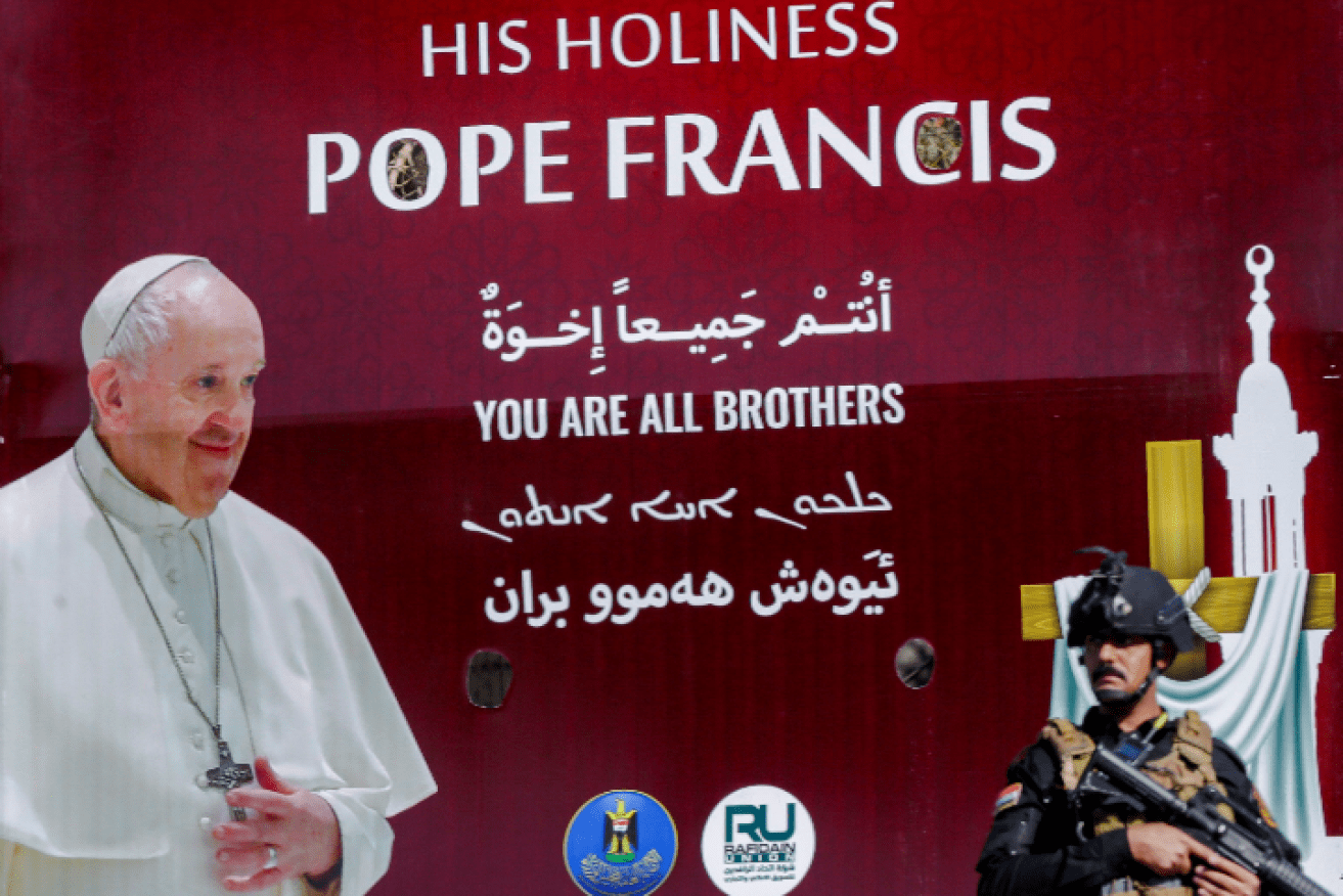 Pope Francis preaches peace in Iraq, but that doesn't mean the soldiers guarding him relax.