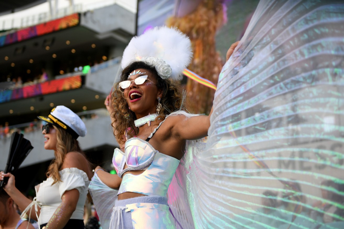 About 5000 marchers joined the rainbow parade at this year's Mardi Gras in a pandemic. 