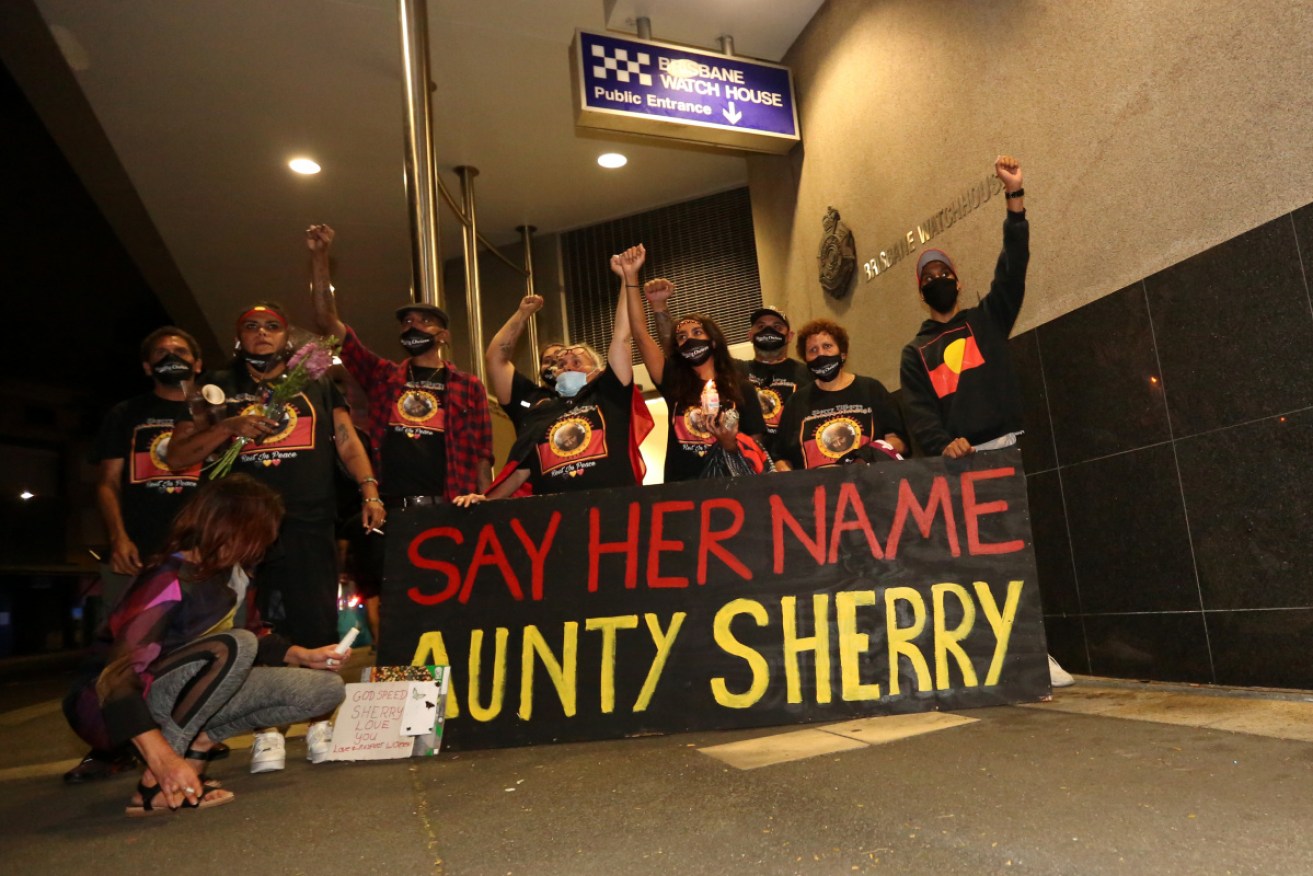 Family of Sherry Tilberoo outside the Brisbane Watch House in September during a vigil to mourn her death in police custody.