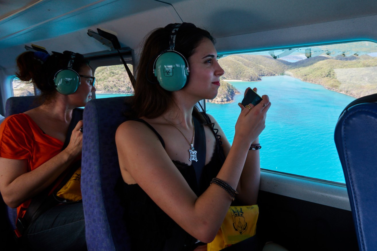 Tourists in the Whitsundays, which is one of the destinations included in the airfare scheme.