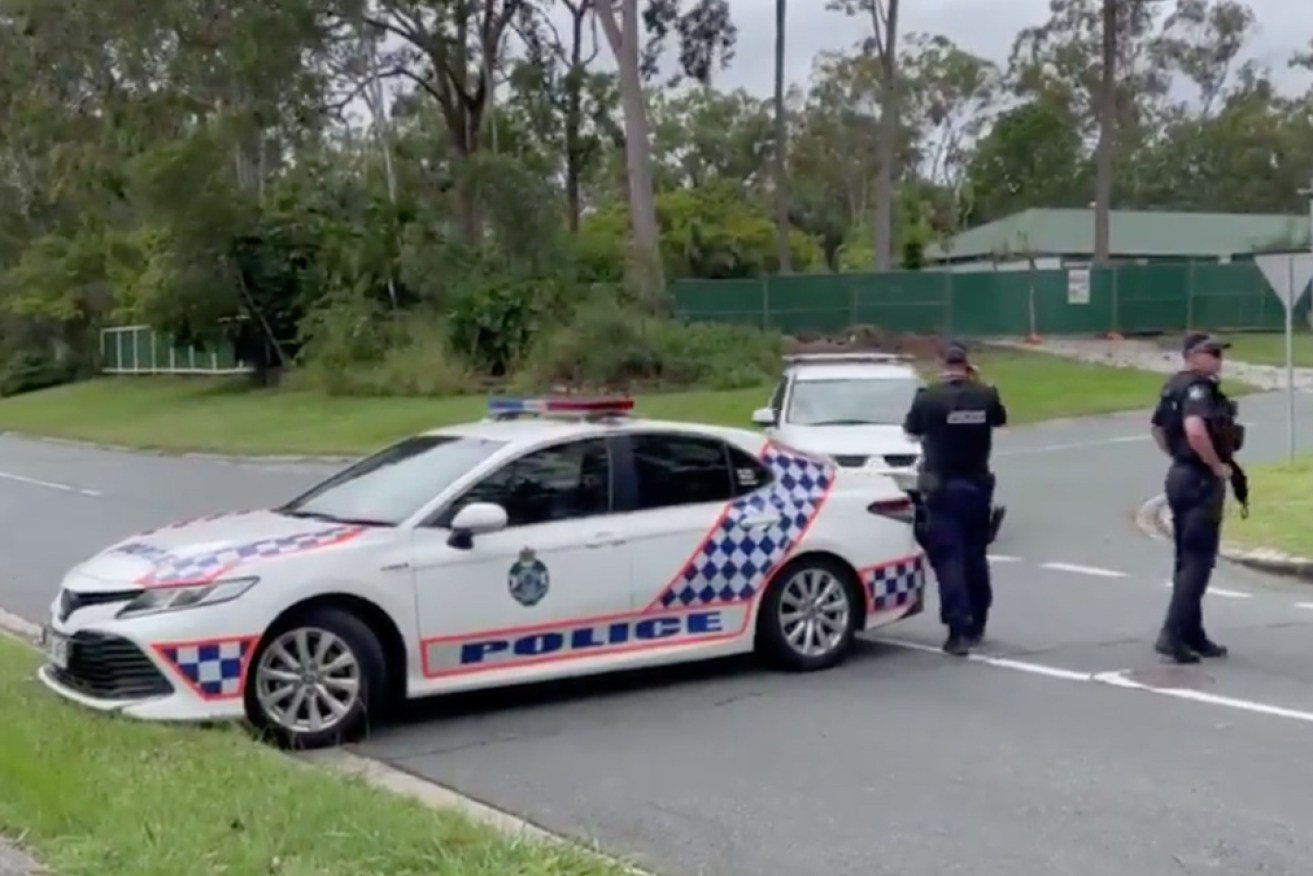 Police outside Ormeau State School on Tuesday afternoon.