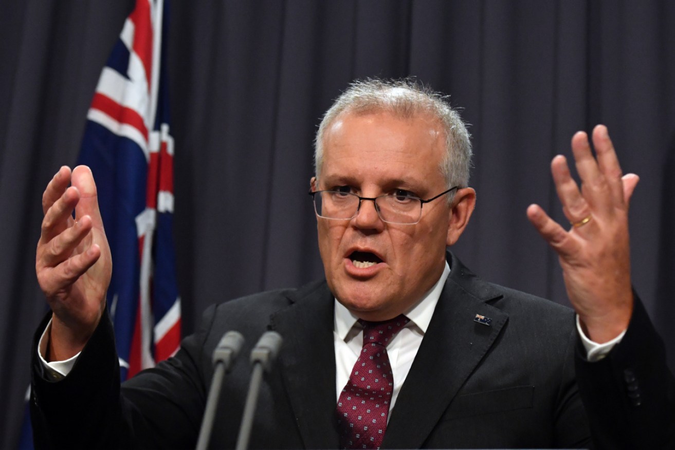 Scott Morrison in Tuesday's press conference. Photo: AAP