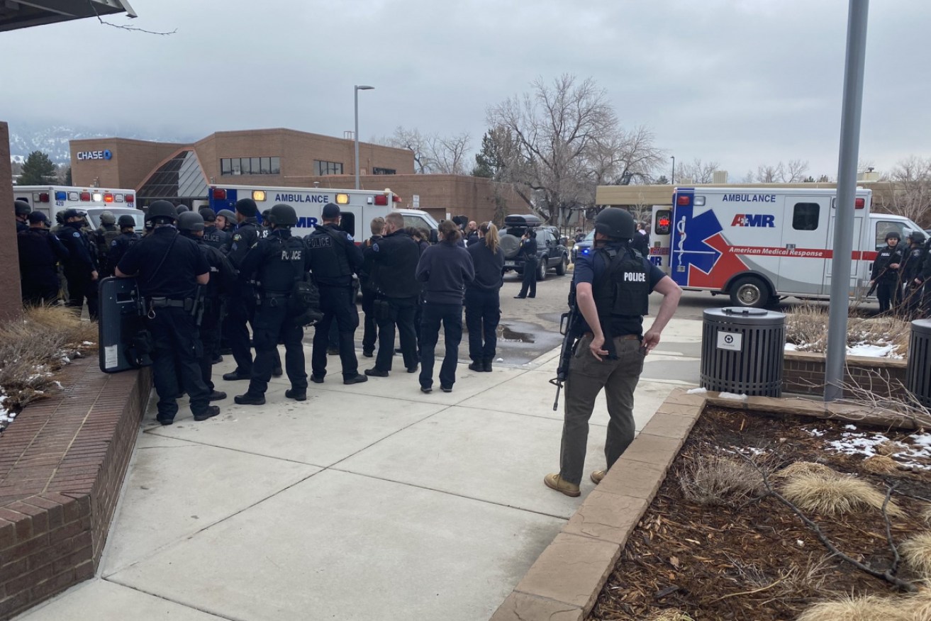 Boulder Police Department officers and emergency services at the scene of a shooting at a King Soopers supermarket in Boulder on Tuesday.