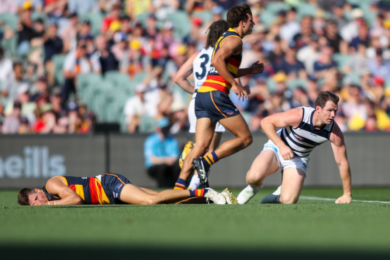 Patrick Dangerfield reacts after his clash with Adelaide’s Jake Kelly on Saturday.