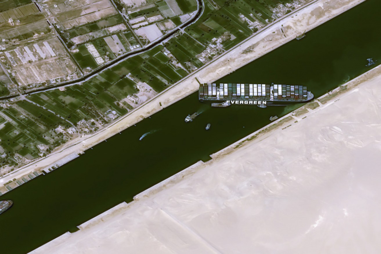 In a tight spot ... a satellite image of the container vessel Ever Given stuck in the Suez Canal.