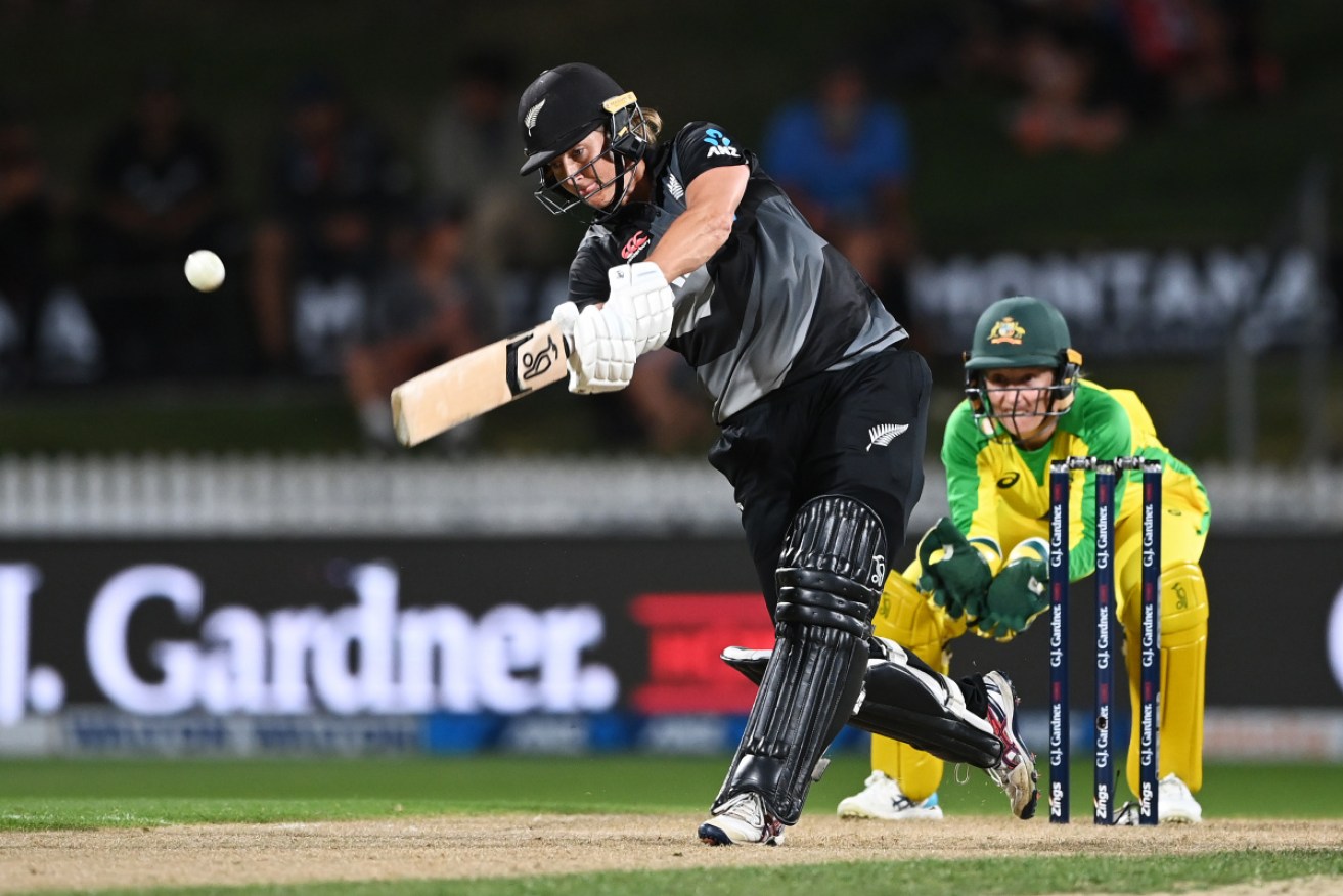 New Zealand's Sophie Devine gets a ball away in the first  T20 international against Australia at Hamilton on Sunday.