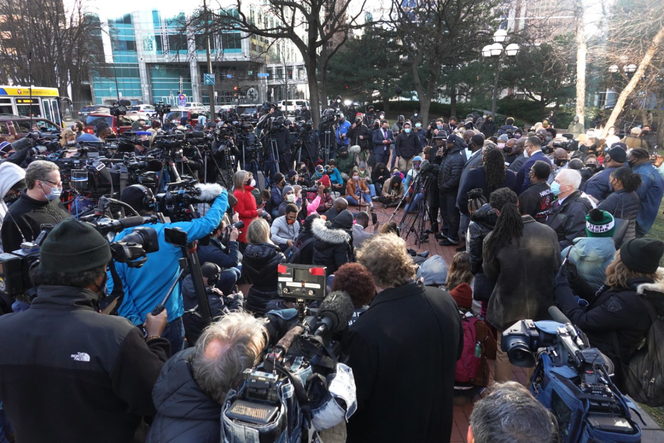 The crowd outside the Minneapolis courtroom after the first day of the George Floyd murder trial.