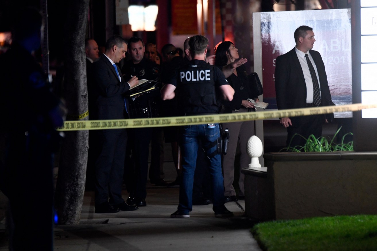 Police outside the office building where the deadly shooting occurred.