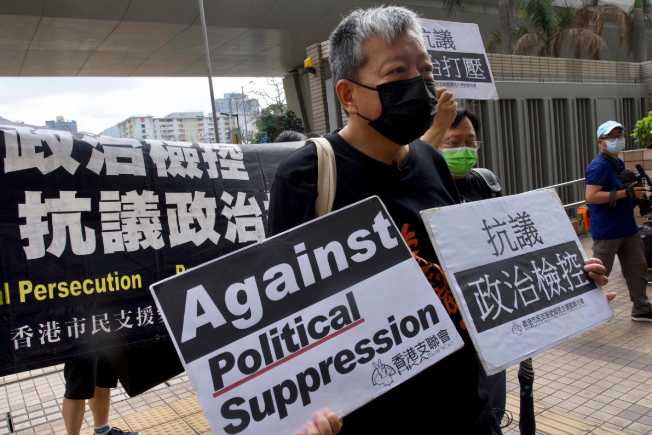 Lee Cheuk-yan, center, said he would still march in the future, despite the result of the trial.