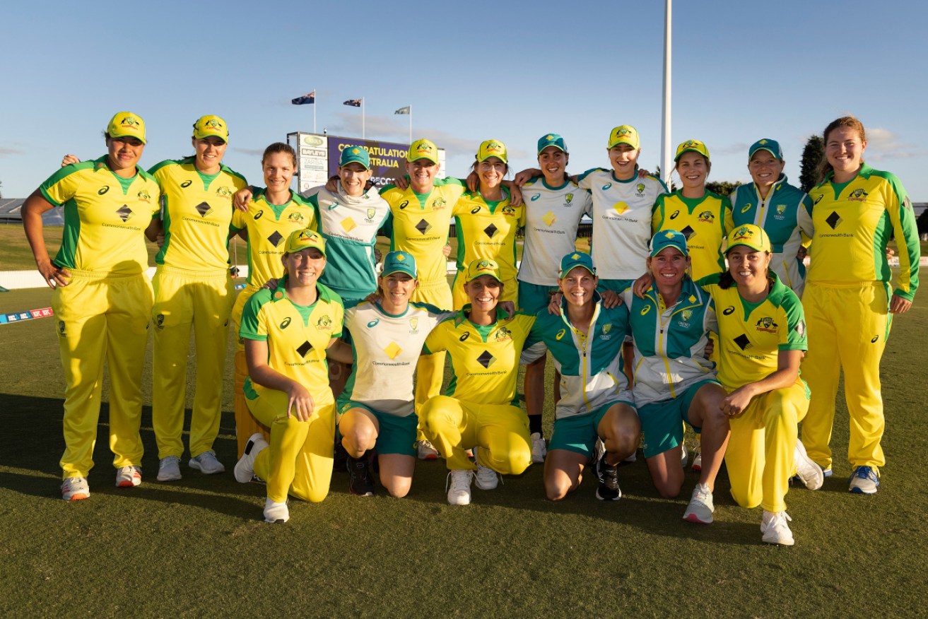 The record-breaking Australian women cricketers after Sunday's win.
