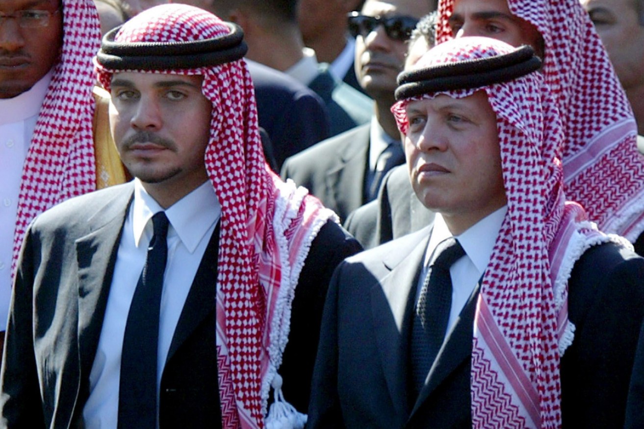 Former Jordanian Crown Prince Hamzah bin Al Hussein (left), pictured with his half brother King Abullah, is accused of plotting against the kingdom.