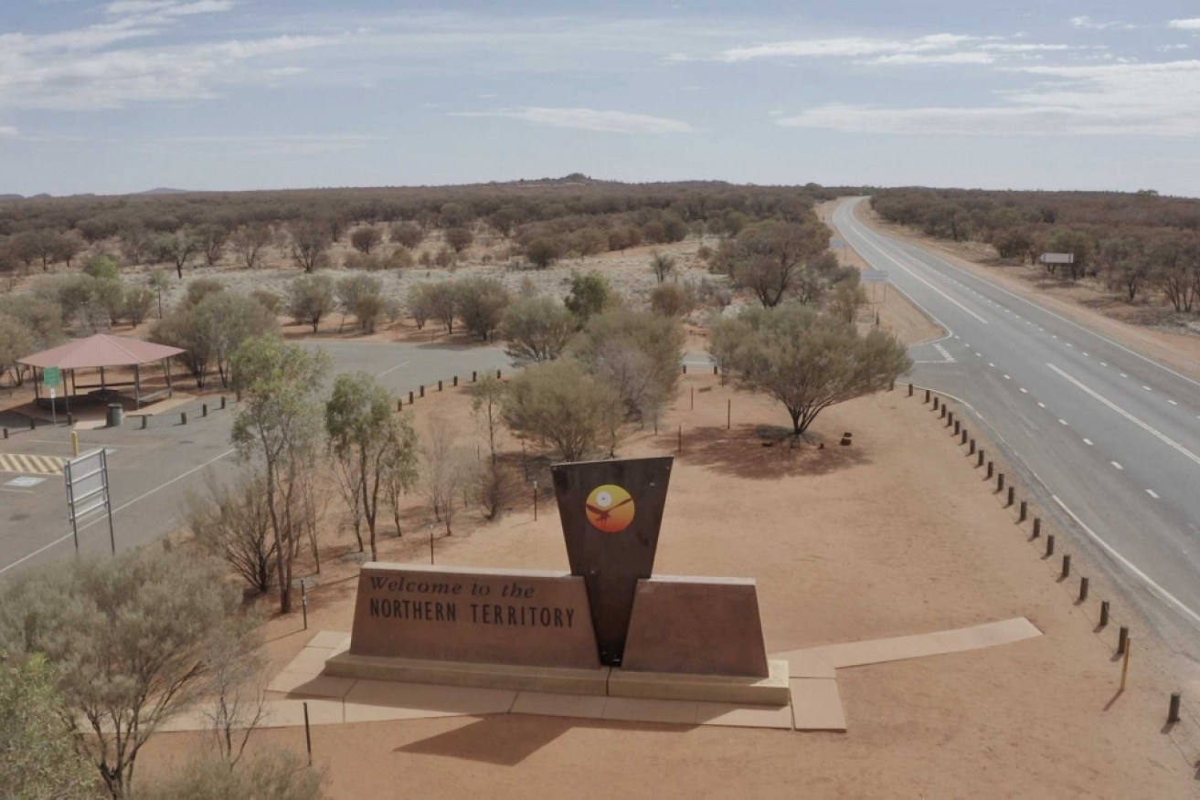 The tourists were bogged on a remote dirt track not visible from the Stuart Highway.